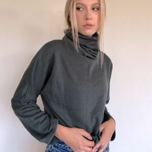 Green turtleneck